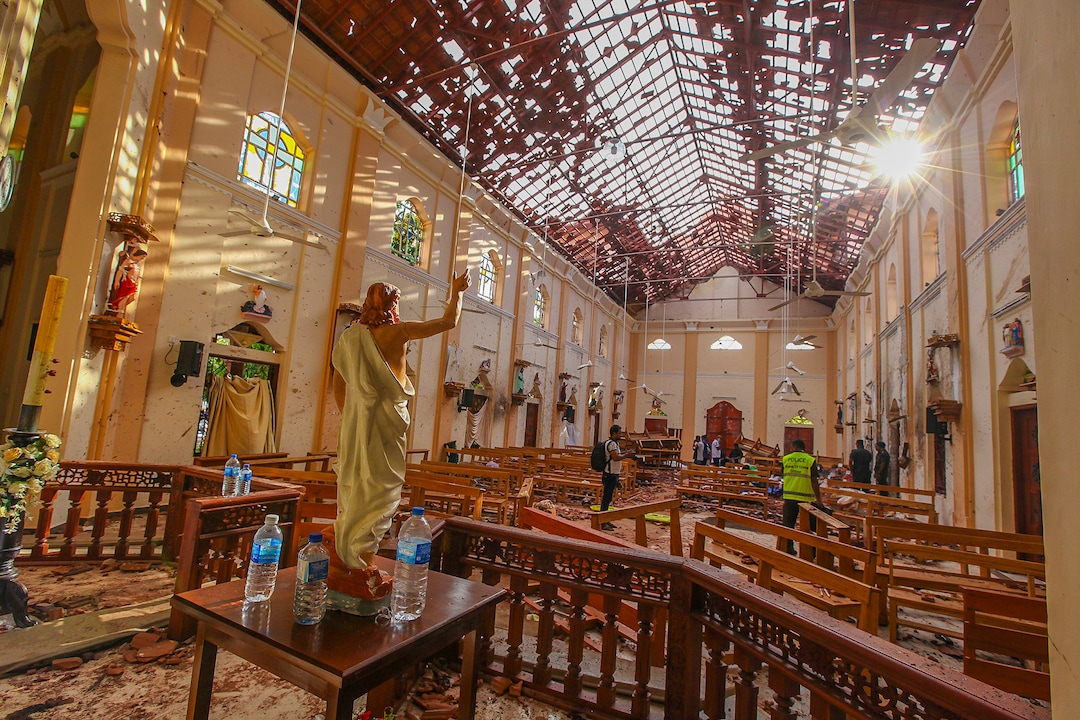 A view of St. Sebastian's Church damaged in blast in Negombo, north of Colombo, Sri Lanka, Sunday, April 21, 2019.  More than hundred were killed and hundreds more hospitalized with injuries from eight blasts that rocked churches and hotels in and just outside of Sri Lanka's capital on Easter Sunday, officials said, the worst violence to hit the South Asian country since its civil war ended a decade ago. (AP Photo/Chamila Karunarathne)