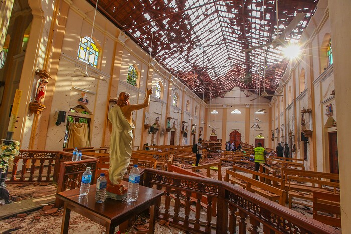 A view of St. Sebastian's Church damaged in blast in Negombo, north of Colombo, Sri Lanka, Sunday, April 21, 2019.  More than hundred were killed and hundreds more hospitalized with injuries from eight blasts that rocked churches and hotels in and just outside of Sri Lanka's capital on Easter Sunday, officials said, the worst violence to hit the South Asian country since its civil war ended a decade ago. (AP Photo/Chamila Karunarathne)