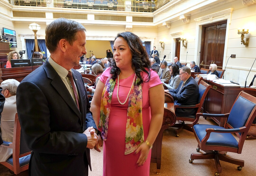 (Francisco Kjolseth  |  The Salt Lake Tribune)  Congressman Chris Stewart speaks with Senator Luz Escamilla, D-Salt Lake, who said "tell us you are going to take care of the Dreamers, right?" as he visits the senate floor on day two of the 2018 legislative session on Tuesday, Jan. 23, 2018. Daca 'Dreamers' is the federal government program created in 2012 under Barack Obama to allow people brought to the US illegally as children the temporary right to live, study and work in America.