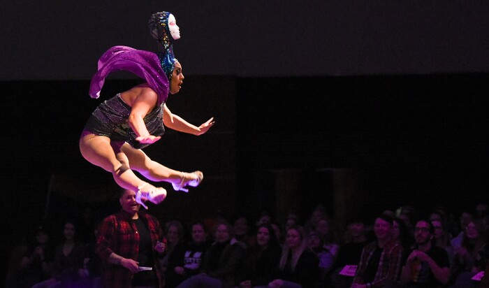 (Francisco Kjolseth  |  The Salt Lake Tribune)  Jared Espiritu, who goes by his drag queen name Aliyah, does a toe touch in heels before a large crowd at Utah State University, hosting their first ever drag show recently. Espiritu who lovingly calls his mannequin head Ornacia, put on an athletic and spirited performance as the crowd cheered him on.
