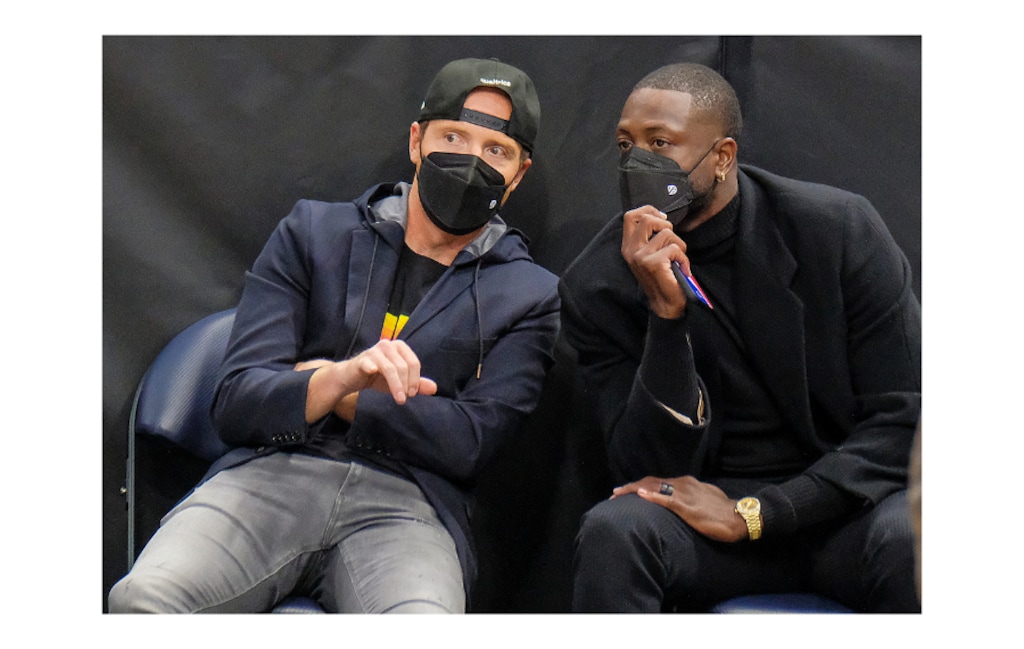 (Leah Hogsten | The Salt Lake Tribune) Utah Jazz majority owner and Qualtrics founder Ryan Smith and former Miami Heat guard and new Jazz minority owner Dwyane Wade talk as the Utah Jazz host the Indiana Pacers, Friday, April 16, 2021, at Vivint Arena.
