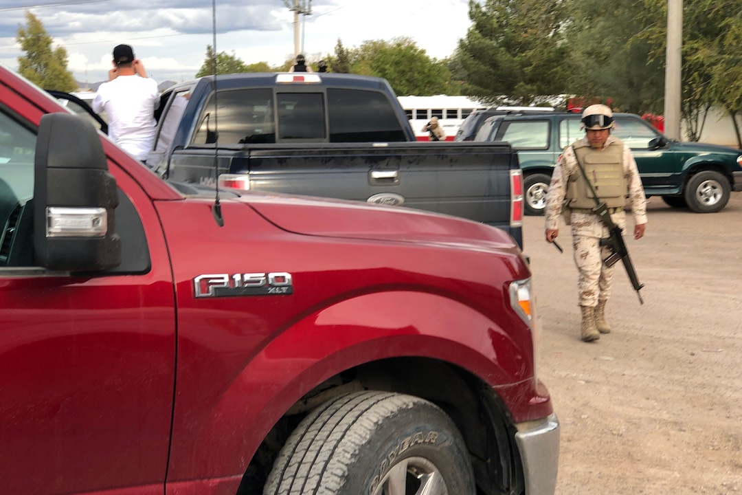 (Trent Nelson |  The Salt Lake Tribune) Mexican military escorts family members of those slain in a recent attack in Sonora through the area as they make their way to funerals on Wednesday, November 6, 2019.