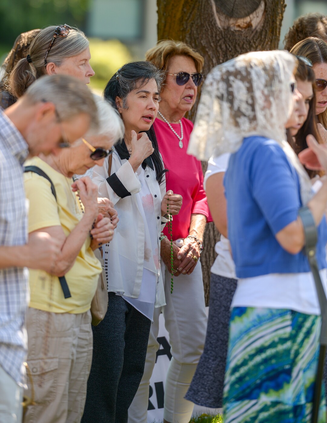 Leah Hogsten  |  The Salt Lake Tribune   Catholic priest, Rev. Jan Bednarz of St. Martin de Porres Parish in Taylorsville, leads the "blessed sacrament" and exorcism at the Planned Parenthood offices on the Feast of the Assumption. Bednarz was joined by the group, "40 Days for Life Utah," to protest Planned Parenthood. 