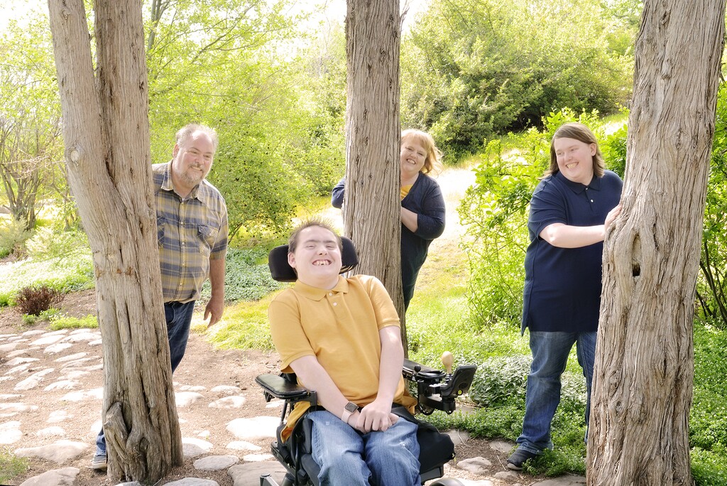 (Photo courtesy of Jodi Hansen) COVID-19 has brought additional challenges for Jodi and Mark Hansen of Eagle Mountain and their sons, Brendon, 22, and Jacob, 20. Jacob is immunocompromised and needs 24-hour care for complications from cystic fibrosis and cerebral palsy. Brendon, who has a high-functioning form of autism, quit his job as a caregiver to help take care of his brother, but the program that allows him to be paid for that work expires at the end of June. 