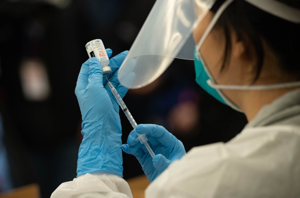 (Francisco Kjolseth | The Salt Lake Tribune) Pharmacy tech Mikaela Brigino prepares the Moderna COVID-19 vaccine for seniors and staff at assisted living The Ridge Foothill in Salt Lake City on Tuesday, Dec. 29, 2020, as the rollout continues at long-term care facilities.