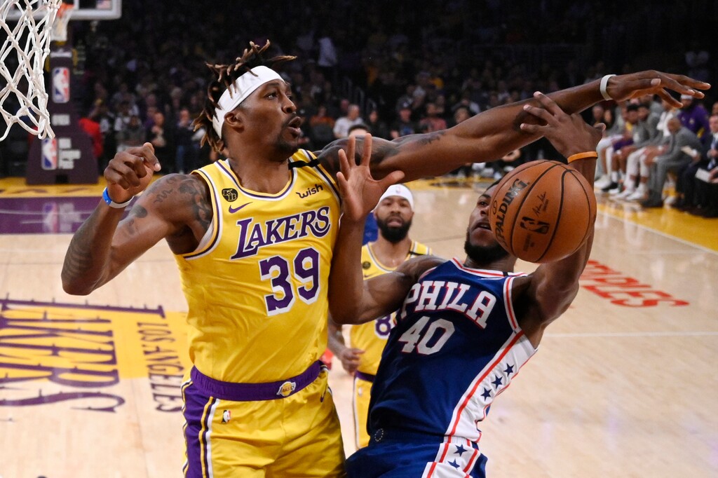 (Mark J. Terrill | AP photo)

Los Angeles Lakers center Dwight Howard, left, blocks the shot of Philadelphia 76ers forward Glenn Robinson III during the first half of an NBA basketball game, March 3, in Los Angeles.