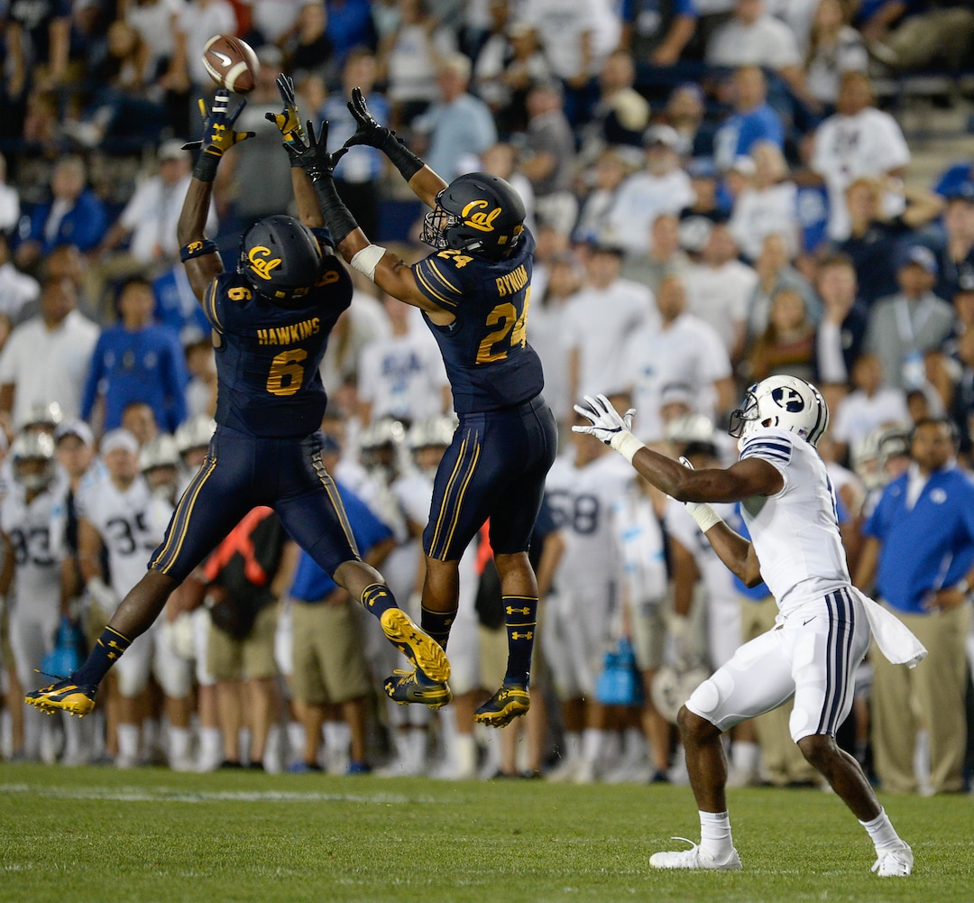 (Francisco Kjolseth  |  The Salt Lake Tribune)  California Golden Bears safety Jaylinn Hawkins (6) pulls in a pass intended for Brigham Young Cougars wide receiver Akile Davis (1) during the second half of the NCAA college football game, Saturday, Sept. 8, 2018, at LaVell Edwards stadium in Provo, Utah.