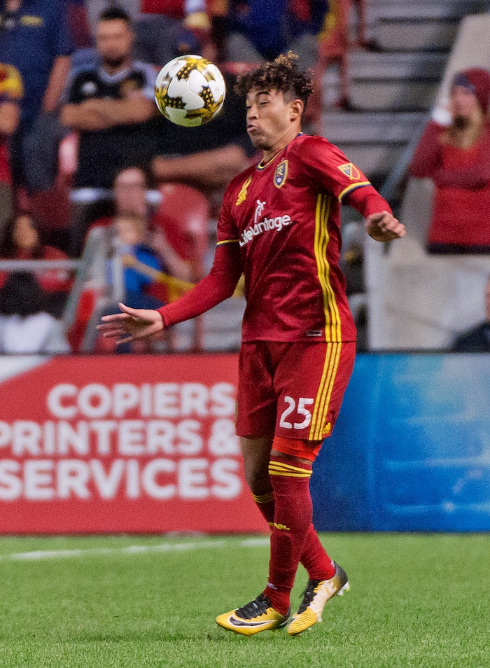 (Michael Mangum  |  Special to the Tribune)  Real Salt Lake midfielder Danilo Acosta (25) tries to head down the ball during their MLS match against the Portland Timbers at Rio Tinto Stadium in Sandy, UT on Saturday, September 16, 2017.