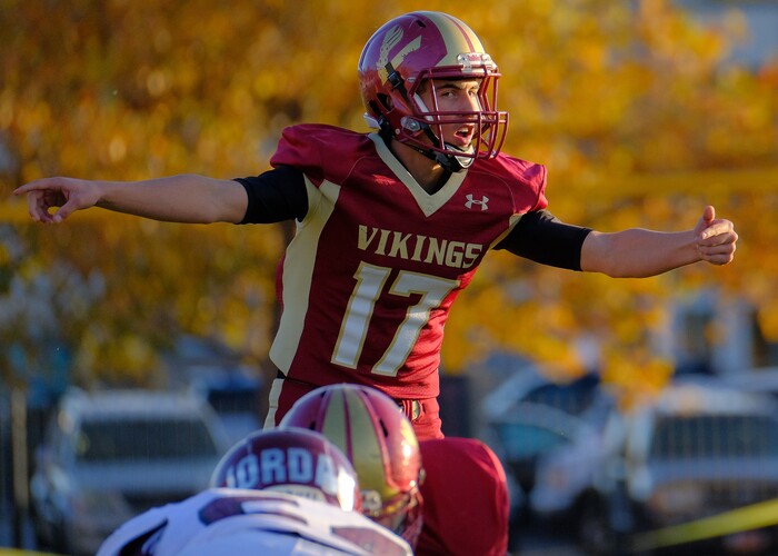 (Leah Hogsten  |  The Salt Lake Tribune) Viewmont's quarterback Davis Weir assesses the defense. Jordan High School boys' football team defeated Viewmont High School 28-20 during their class 5A football playoff opener, Friday, October 27, 2017 in Bountiful.