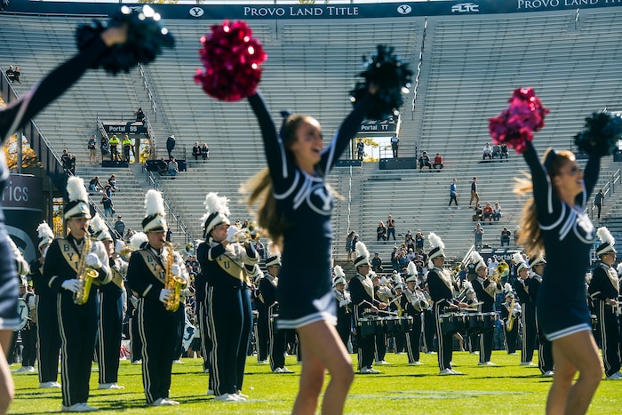 (Chris Detrick  |  The Salt Lake Tribune)  The BYU marching band and cheerleaders perform before the game against San Jose State at LaVell Edwards Stadium Saturday, October 28, 2017.  