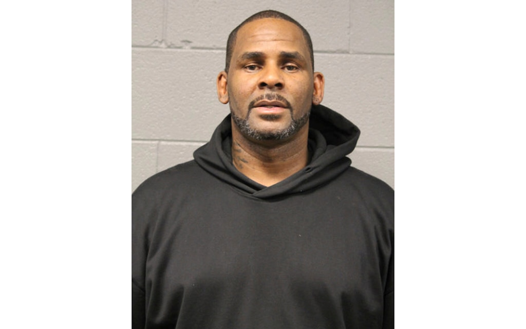 (Chicago Police Dept. | The Associated Press) In this photo taken and released by the Chicago Police Dept., Friday, Feb. 22, 2019, R&B singer R. Kelly is photographed during booking at a police station in Chicago, Il. R. Kelly, the R&B star who has been trailed for decades by allegations that he violated underage girls and women and held some as virtual slaves, is due in court Saturday after being charged with aggravated sexual abuse involving four victims, including at least three between the ages of 13 and 17.