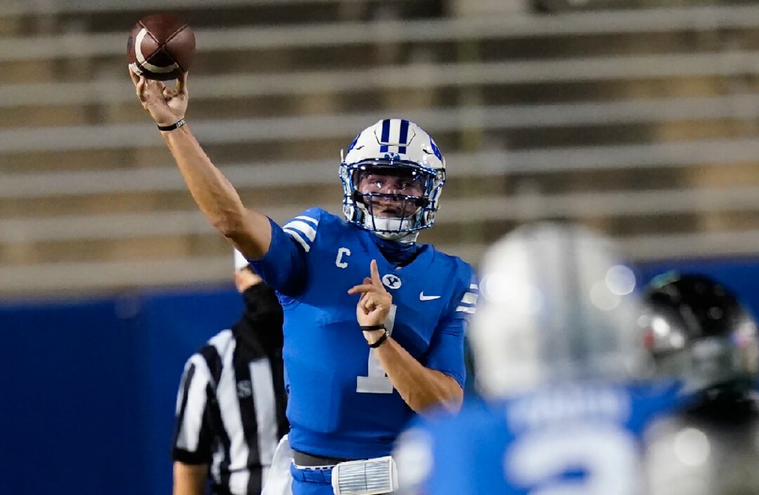 BYU quarterback Zach Wilson throws a pass during the first half against Troy in an NCAA college football game Saturday, Sept. 26, 2020, in Provo, Utah. (AP Photo/Rick Bowmer, Pool)