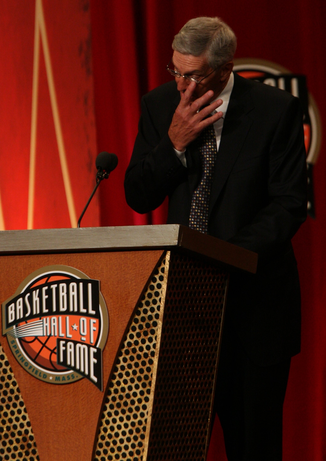 (Leah Hogsten  |  Tribune file photo) Jerry Sloan wipes a tear from his eye as he is inducted into the Naismith Basketball Hall of Fame in 2009.