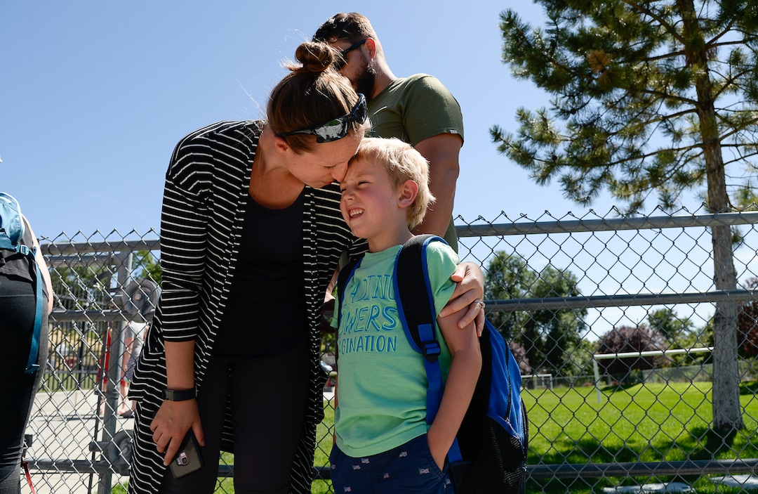 (Francisco Kjolseth  |  The Salt Lake Tribune)  Lana Medina picks up her son Dylan, 5, following an exciting first day of kindergarten at Washington Elementary on Monday, Aug. 19, 2019.