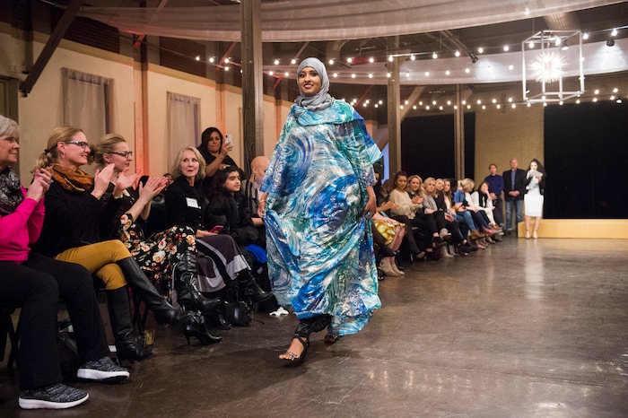(Rick Egan  |  The Salt Lake Tribune) Halima Noor, models an outfit from Somalia at the 8th Annual Women of the World Fashion Show. The fashion show fund is raiser for the non-profit that seeks to help refugees settle in a new culture. Wednesday, March 7, 2018.