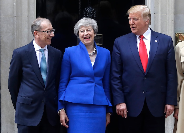 Britain's Prime Minister Theresa May and her husband Philip greet President Donald Trump outside 10 Downing Street in central London, Tuesday, June 4, 2019. President Donald Trump will turn from pageantry to policy Tuesday as he joins British Prime Minister Theresa May for a day of talks likely to highlight fresh uncertainty in the allies' storied relationship. (AP Photo/Kirsty Wigglesworth)