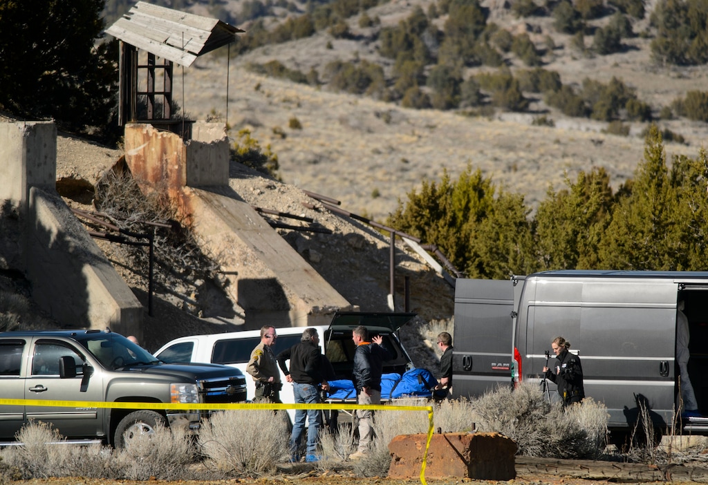 (Steve Griffin  |  The Salt Lake Tribune) Law enforcement officials load one of two bodies into the Medical Examiners truck after they were recovered from an abandoned mine in UtahÕs west desert near Eureka Wednesday March 28, 2018. Police believe the bodies are those of two teenagers who have been missing for nearly three months. in  Wednesday March 28, 2018.