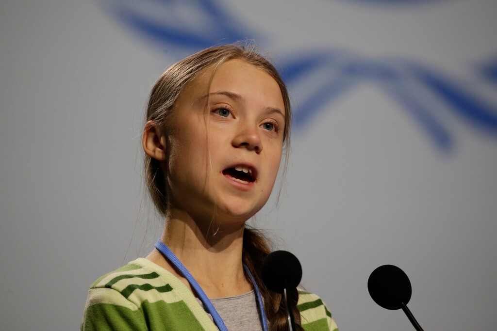 (Paul White | AP file photo) Swedish climate activist Greta Thunberg addresses plenary of U.N. climate conference during with a meeting with leading climate scientists at the COP25 summit in Madrid, Spain, Wednesday, Dec. 11, 2019. Thunberg is in Madrid where a global U.N.-sponsored climate change conference is taking place.