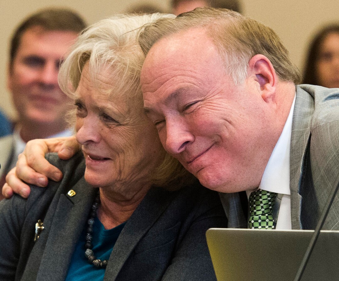 (Rick Egan  |  The Salt Lake Tribune)   Sen. Jim Dabakis gives Gayle Ruzicka, Utah Eagle Forum, a hug, as she speaks in support of his bill, SJR16 during a Senate Education Committee meeting at the Capitol, Friday, March 2, 2018.