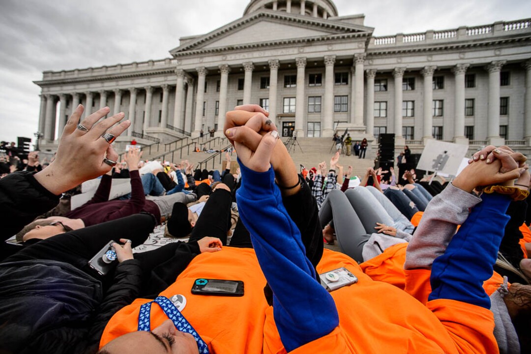 (Trent Nelson | The Salt Lake Tribune)  High school students staged a die-in at the Utah State Capitol in Salt Lake City to mark the anniversary of the Columbine High School massacre and call for action against gun violence, Friday April 20, 2018.