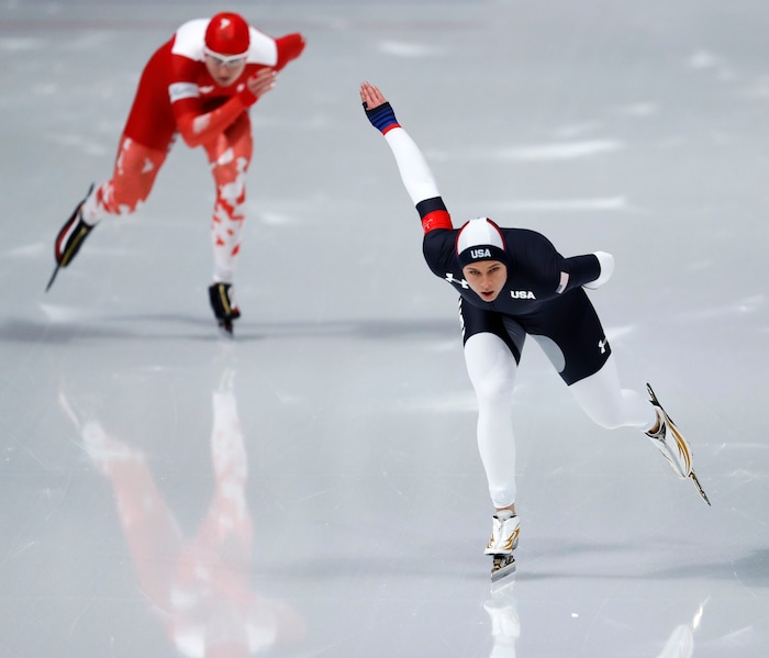 Brittany Bowe of the U.S., right, and Natalia Czerwonka of Poland, left, compete during the women's 1,500 meters speedskating race at the Gangneung Oval at the 2018 Winter Olympics in Gangneung, South Korea, Monday, Feb. 12, 2018. (AP Photo/John Locher)