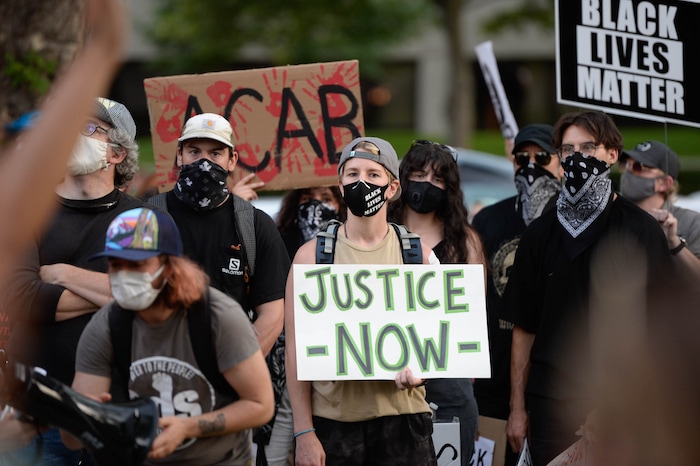 (Francisco Kjolseth  |  The Salt Lake Tribune) As part of national day of protest against police crimes, the National Alliance Against Racist and Political Repression, the Salt Lake Civilian Police Accountability Council and other groups gather at the mansion of Governor Gary Herbert on Saturday, July 18, 2020, to demand for a special session to repeal HB 415, which prohibits municipalities from establishing a board or committee with regulatory power over police departments.