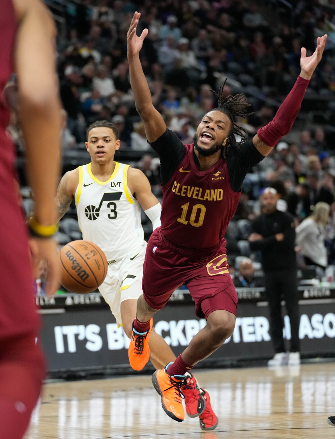 (Francisco Kjolseth  |  The Salt Lake Tribune) Cleveland Cavaliers guard Darius Garland (10) gets tripped up as the Utah Jazz host the Cleveland Cavaliers in NBA action at the Delta Center in Salt Lake City on Tuesday, April 2, 2024.