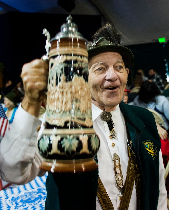 (Rick Egan  |  The Salt Lake Tribune)   Helmut Wenzel from Centerville, sings along with the band, at the Oktoberfest celebration at Snowbird. Sunday, Sept. 30, 2018.
