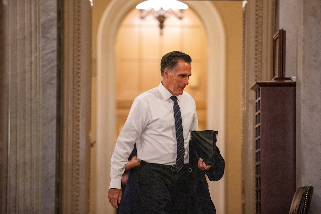 (Jacquelyn Martin | AP) Sen. Mitt Romney, R-Utah, walks to the Senate chamber on Capitol Hill in Washington, Thursday, Jan. 30, 2020, during a break in the impeachment trial of President Donald Trump on charges of abuse of power and obstruction of Congress.