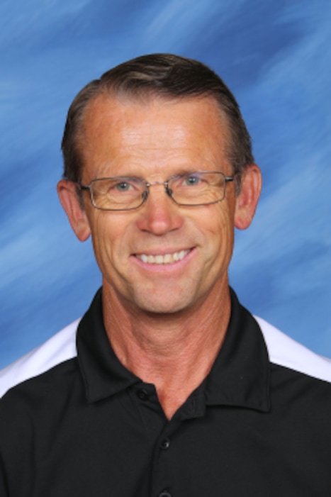 (Courtesy Preston Junior High School) Science teacher Robert Crosland was accused of animal cruelty after reportedly feeding a sick puppy to a snapping turtle after hours at school.