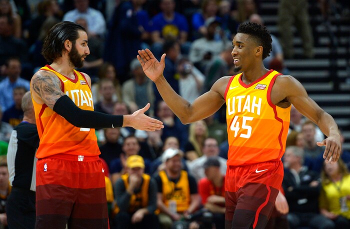 (Steve Griffin  |  The Salt Lake Tribune) Utah Jazz guard Ricky Rubio (3) and Utah Jazz guard Donovan Mitchell (45) celebrate a victory over the NBA Champion Golden State Warrior at Vivint Smart Home Arena in Salt Lake City Tuesday January 30, 2018.