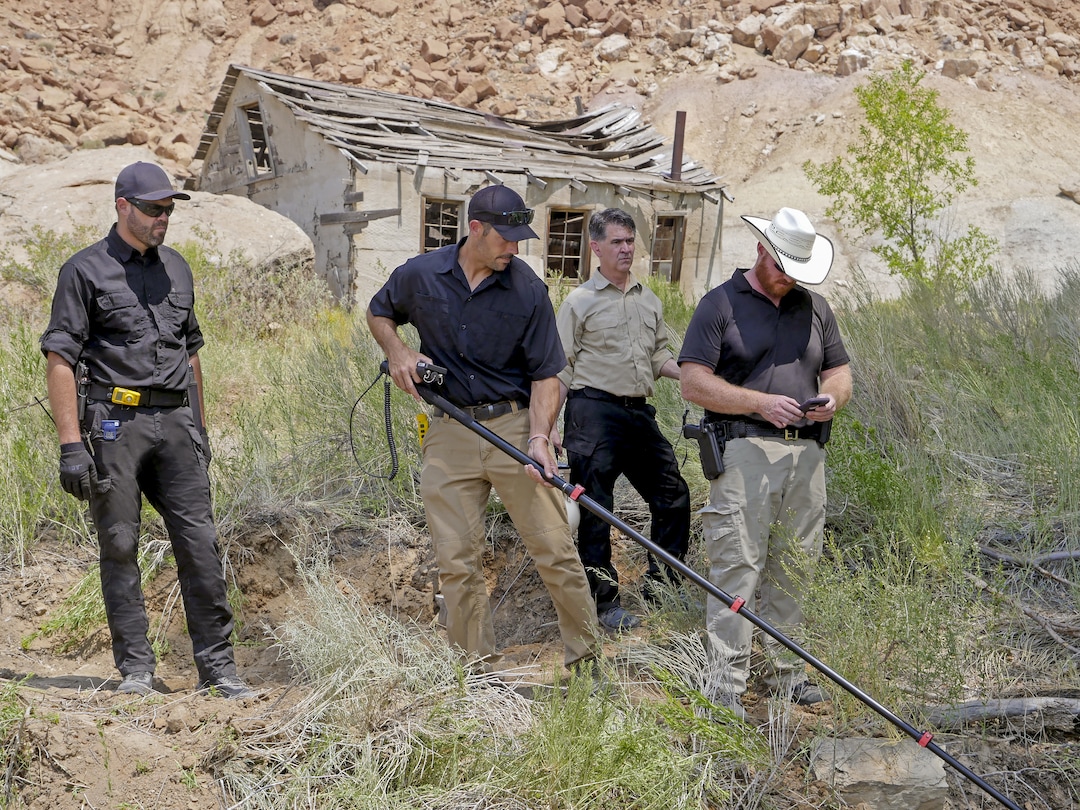 (History Channel) Bryant “Dragon” Arnold, Casey Smith, Erik Bard and Kaleb Bench, from left, check the radiation in a sinkhole pit on Skinwalker Ranch, in a moment from History’s series “The Secret of Skinwalker Ranch.”