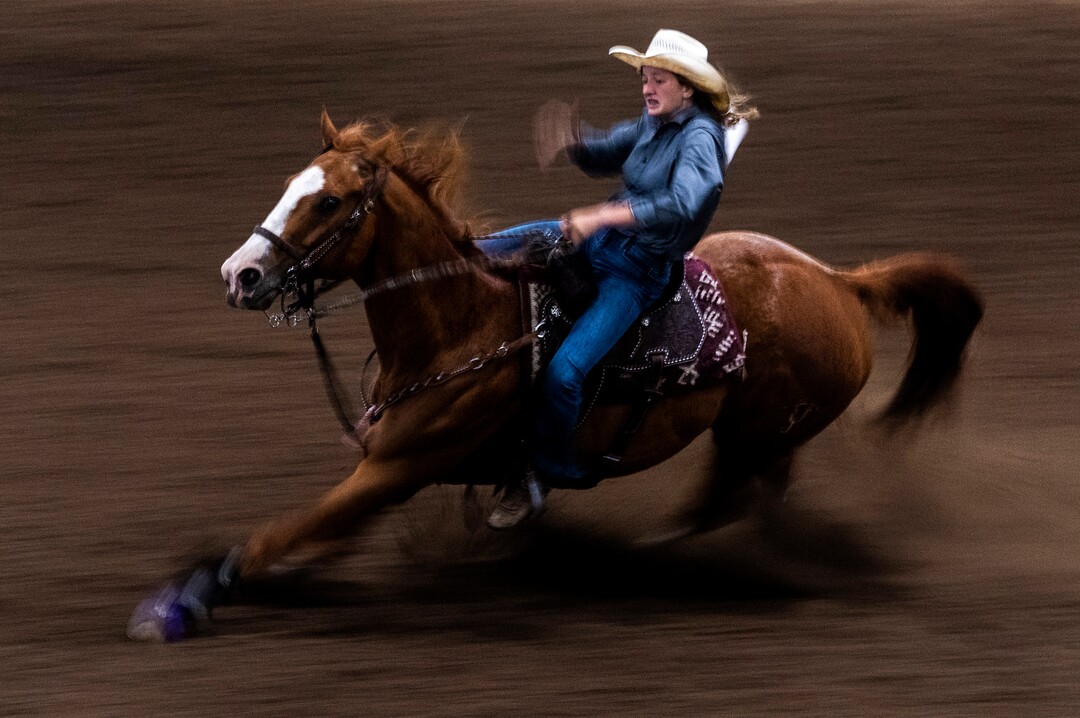(Rick Egan | The Salt Lake Tribune) Ashley Barratt competes in the barrel racing completion at the Panguitch Invitation Rodeo on Saturday, July 23, 2022.