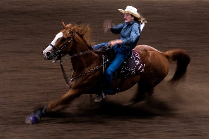 (Rick Egan | The Salt Lake Tribune) Ashley Barratt competes in the barrel racing completion at the Panguitch Invitation Rodeo on Saturday, July 23, 2022.