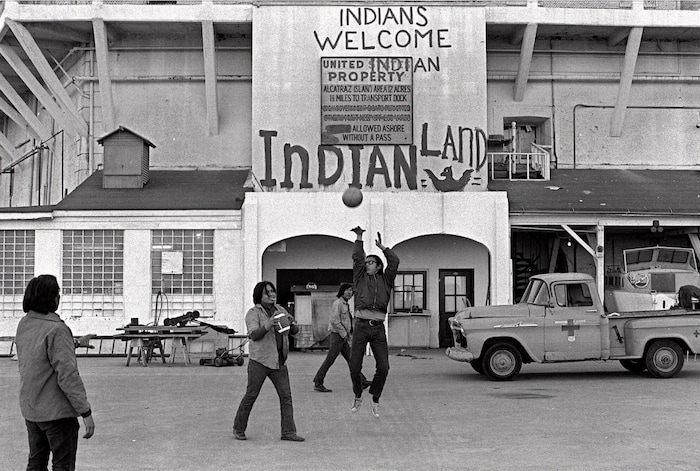 (AP file photo) In this Nov. 26, 1969, file photo, Native Americans play ball games at the main dock area on Alcatraz in San Francisco during their occupation of the island. The week of Nov. 18, 2019, marks 50 years since the beginning of a months-long Native American occupation at Alcatraz Island in the San Francisco Bay. The demonstration by dozens of tribal members had lasting effects for tribes, raising awareness of life on and off reservations, galvanizing activists and spurring a shift in federal policy toward self-determination.