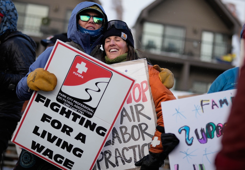 (Francisco Kjolseth  | The Salt Lake Tribune) Megan McKenna, left, and Kate Foley embrace while on the picket line at Park City Mountain Resort on Saturday, Jan. 4, 2025, amid ski patroller contract negotiations with Vail Resorts. The union and the resort announced Tuesday night, Jan. 7, 2025, that they had reached a tentative agreement on a contract.