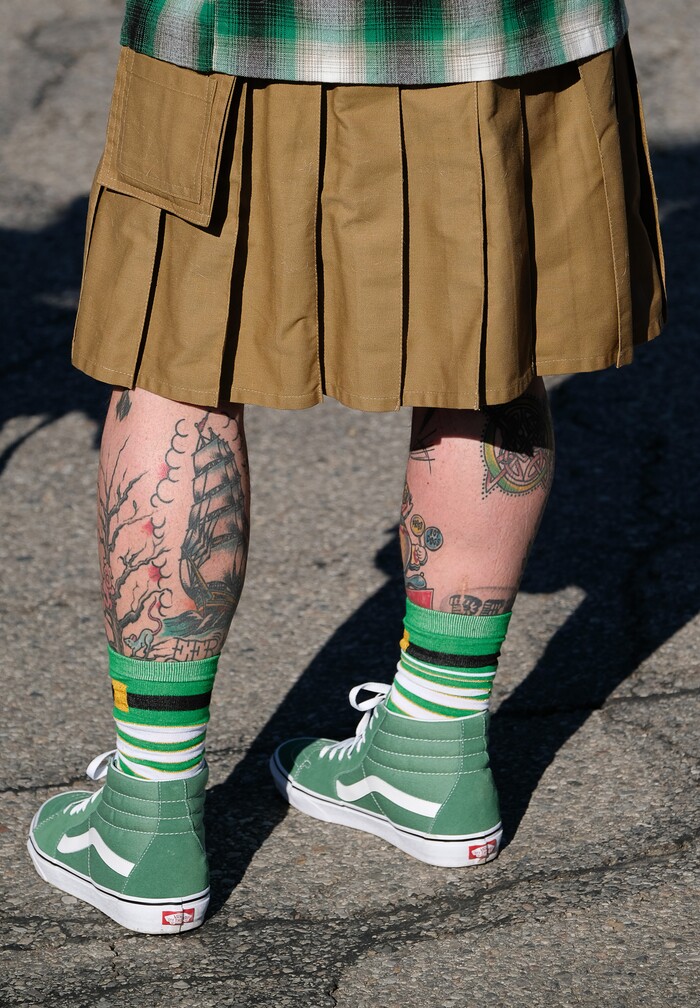 (Francisco Kjolseth | The Salt Lake Tribune) Troy Oyler gets into the Irish spirit as he joins the parade as Salt Lake CityÕs Irish community celebrates their 41st annual St. PatrickÕs Day Parade with crowds lining up to take in the festivities. Marching bands, Irish dancers, bagpipes and a sea of green moved along 200 South, starting at 500 East Saturday morning en route to State street where the Siamsa festivities kept the fun going at the Gallivan Center.