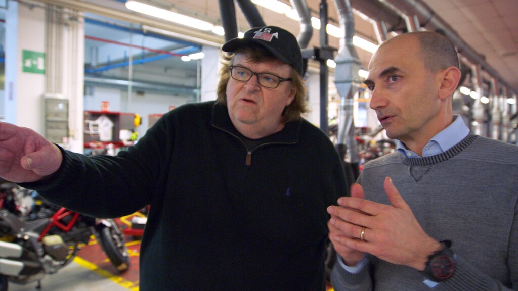 | Eleven Foot Pole
Michael Moore (left) meets Claudio Domenicali, CEO of the Italian motorcycle maker Ducati, as he looks for ideas to make America better, in his latest op-ed documentary, "Where to Invade Next."