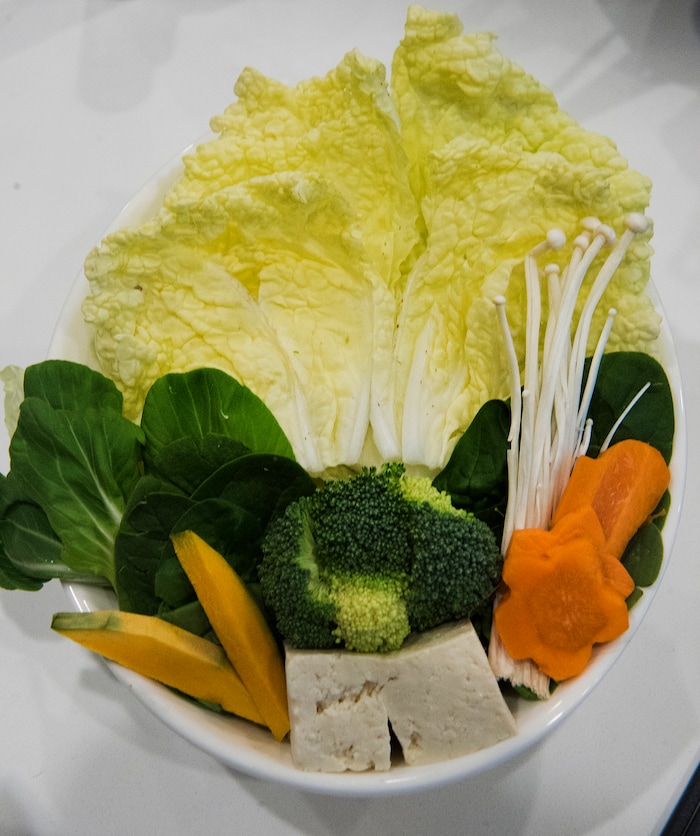 (Rick Egan  |  The Salt Lake Tribune)  Vegetables come with the pork belly with tonkotsu broth at the Tonkotsu Shabu Shabu Bar in West Valley City.