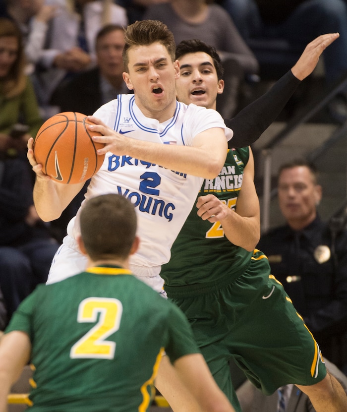 (Rick Egan  |  The Salt Lake Tribune)     Brigham Young guard Zac Seljaas (2) grabs a loose ball for the Cougars, in basketball action at the Marriott Center, Saturday, February 10, 2018.