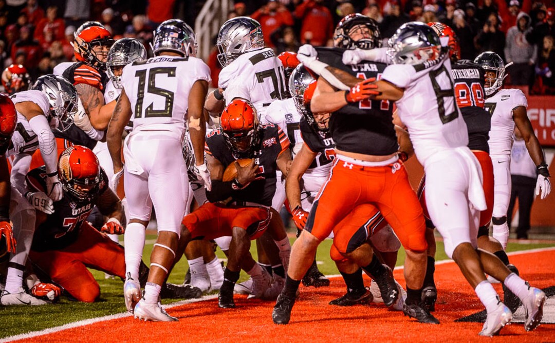(Trent Nelson | The Salt Lake Tribune)  Utah Utes quarterback Jason Shelley (15) runs for a touchdown. Utah Utes host the Oregon Ducks, NCAA football at Rice-Eccles Stadium in Salt Lake City on Saturday Nov. 10, 2018.