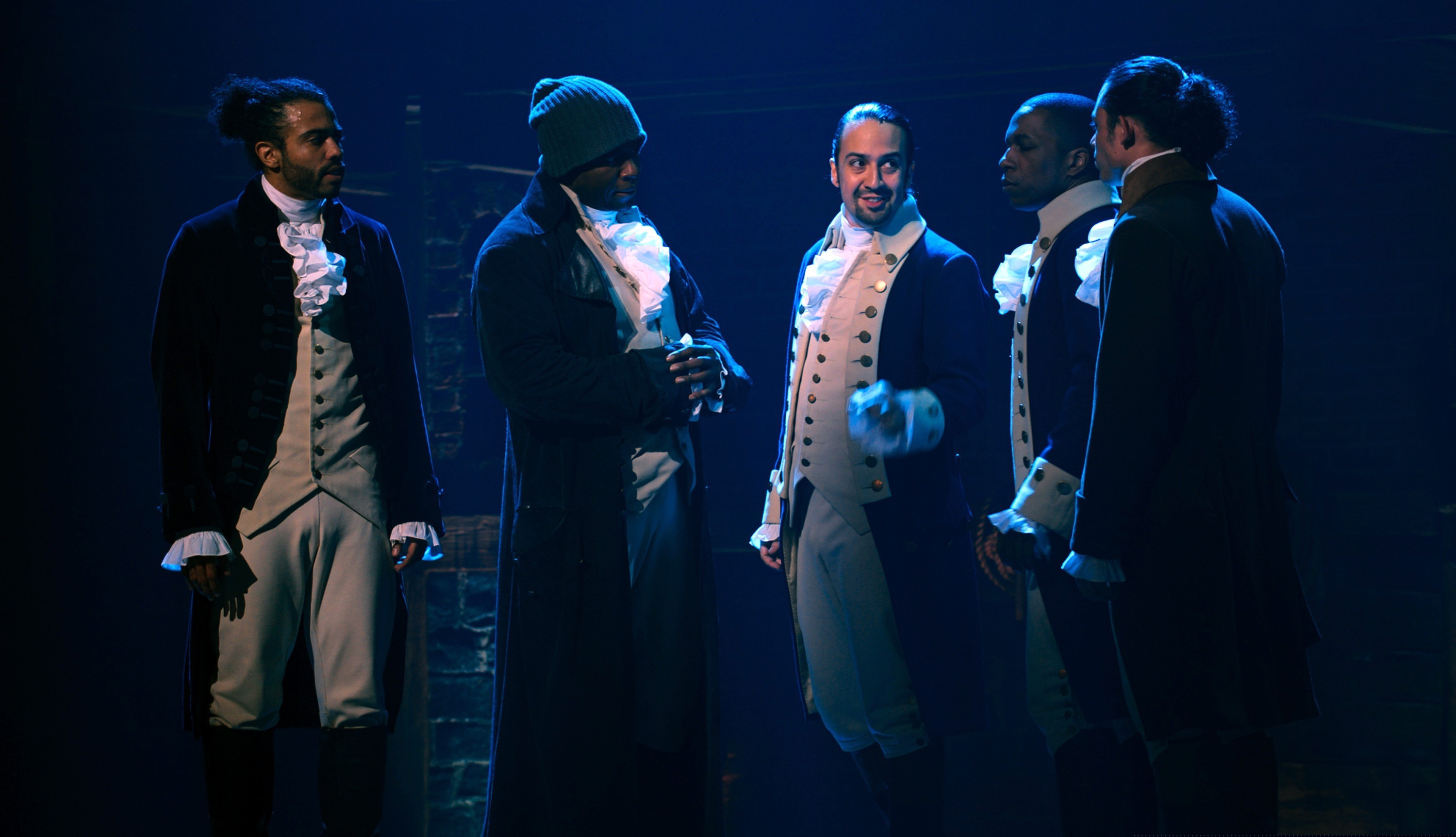 (Disney Plus via AP) In this image released by Disney Plus, from left, Daveed Diggs, Okieriete Onaodowan, Lin-Manuel Miranda, Leslie Odom Jr. and Anthony Ramos appear in a filmed version of the original Broadway production of "Hamilton."