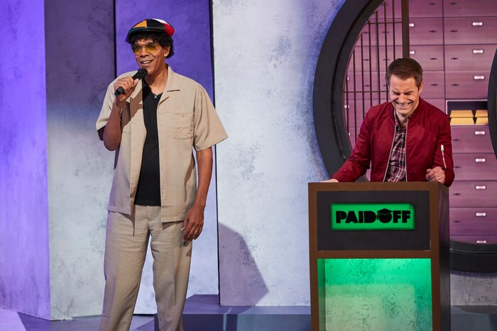(Photo courtesy of truTV) Host Michael Torpey, right, cracks up on the set of "Paid Off."