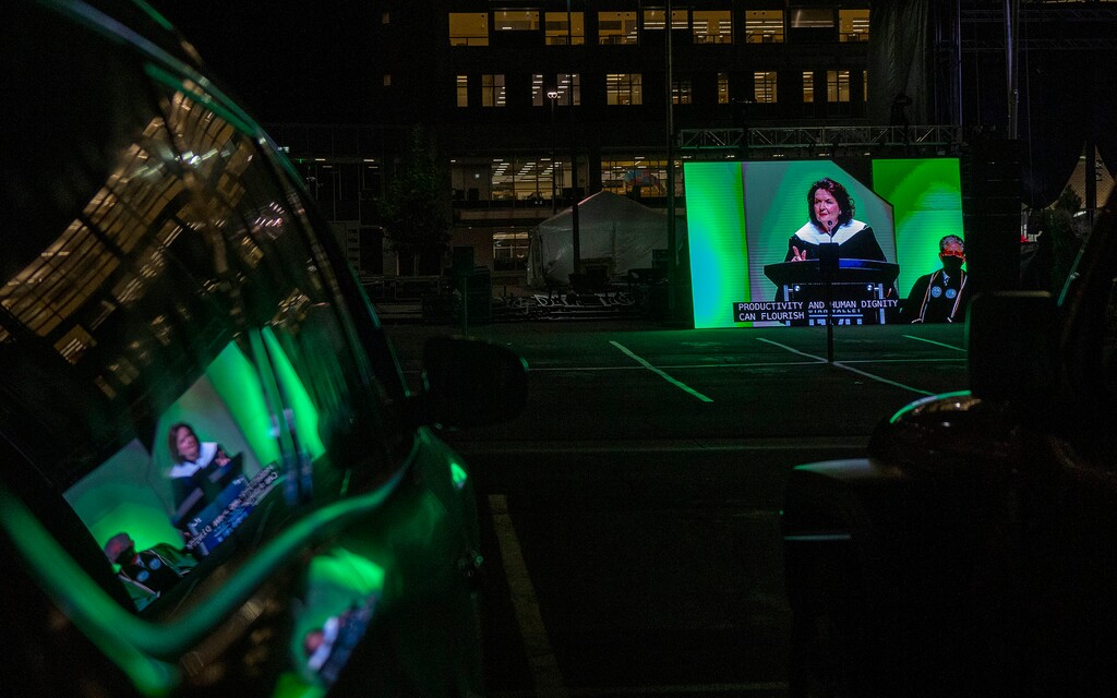 (Rick Egan | The Salt Lake Tribune) Graduates listen in their cars, as commencement speaker, Wendy Watson Nelson speaks, at Utah Valley University's graduation program in Orem, on Friday, May 7, 2021.