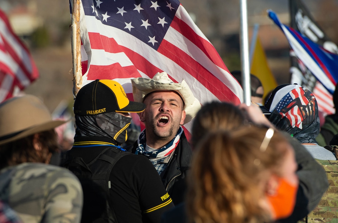 (Francisco Kjolseth  | The Salt Lake Tribune) Trump supporters yell at a small group of people carrying a Black Lives Matter flag during a pro-Trump rally at the Utah State Capitol in Salt Lake City on Wednesday, Jan. 6, 2021.