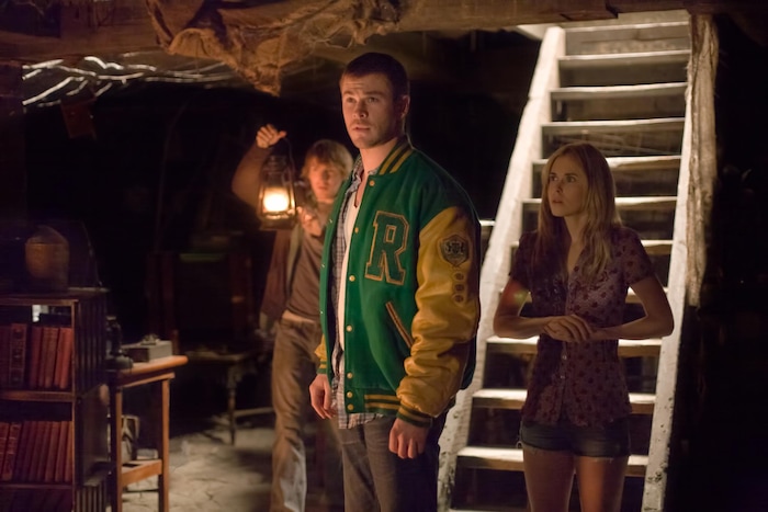 (Courtesy Lionsgate) Teens (from left: Fran Kranz, Chris Hemsworth, Anna Hutchison) find some spooky stuff in the basement in the horror thriller "Cabin in the Woods," which was released in 2012.