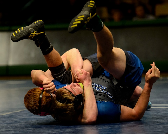 (Steve Griffin  |  The Salt Lake Tribune) Stockton Moat, of Duchesne, clamps down on Taten Ringel, of North Summit, during the All-Star Duals wrestling at Utah Valley University's UCCU Center in Orem Tuesday January 9, 2018.