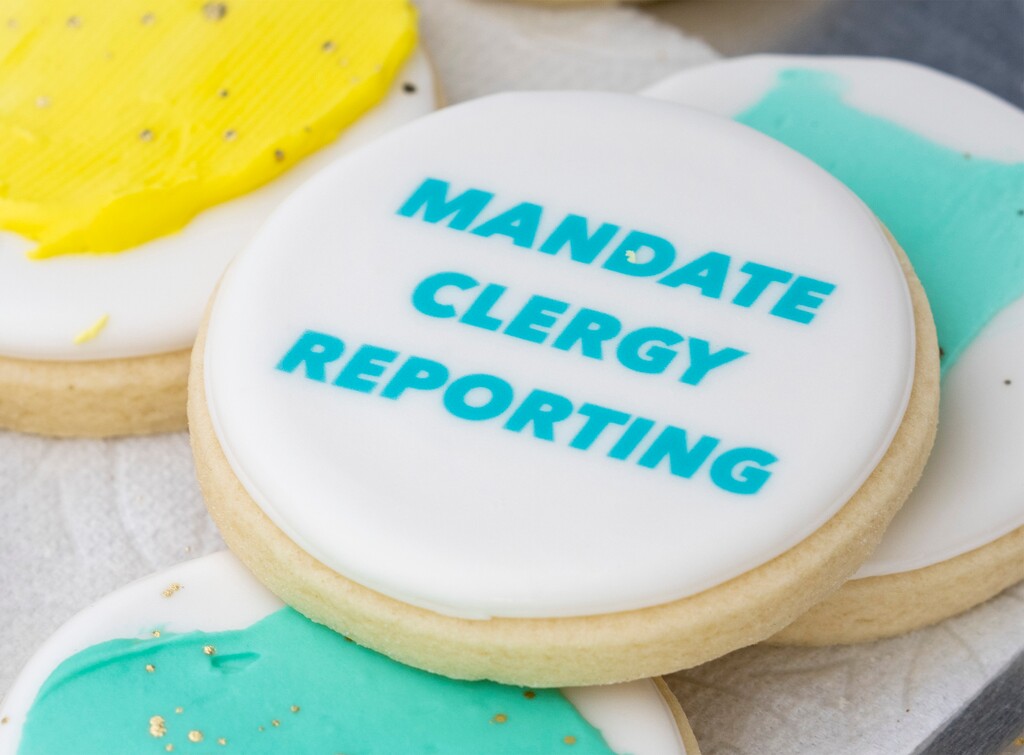 (Rick Egan | The Salt Lake Tribune)  Free cookies at rally to gain support for removing the clergy exemption from mandatory reporting in cases of abuse and neglect, on Friday, Aug. 19, 2022.