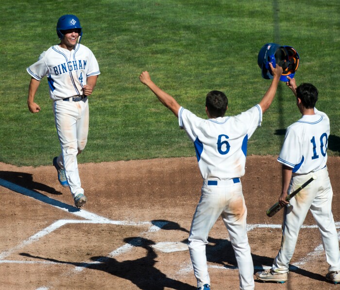 (Rick Egan  |  The Salt Lake Tribune)  The Bingham Miners Tyler Kemp (6) and Nick Stevens (10) celebrate a 3-run homer by Noah Wallick (4), in 6A state baseball State Championship game, at UVU in Orem, Friday, May 25, 2018.