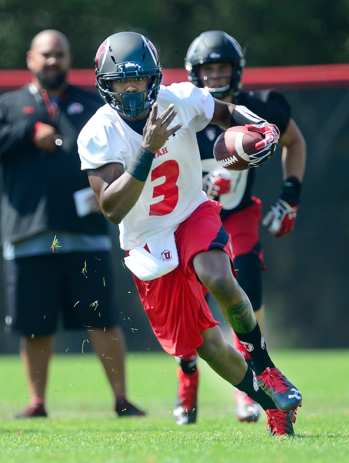Scott Sommerdorf   |  The Salt Lake Tribune  
Utah QB Troy Williams avoids the rush and runs out of the pocket during practice, Thursday, August 4, 2016.